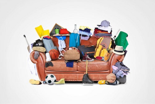 Rubbish clearance team handling household waste in a London street