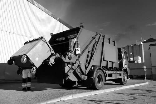 Office clearance team handling furniture removal in a London workspace