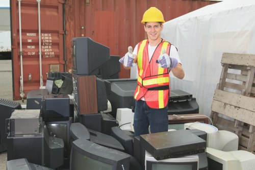 Team collecting a bulky sofa from a London property